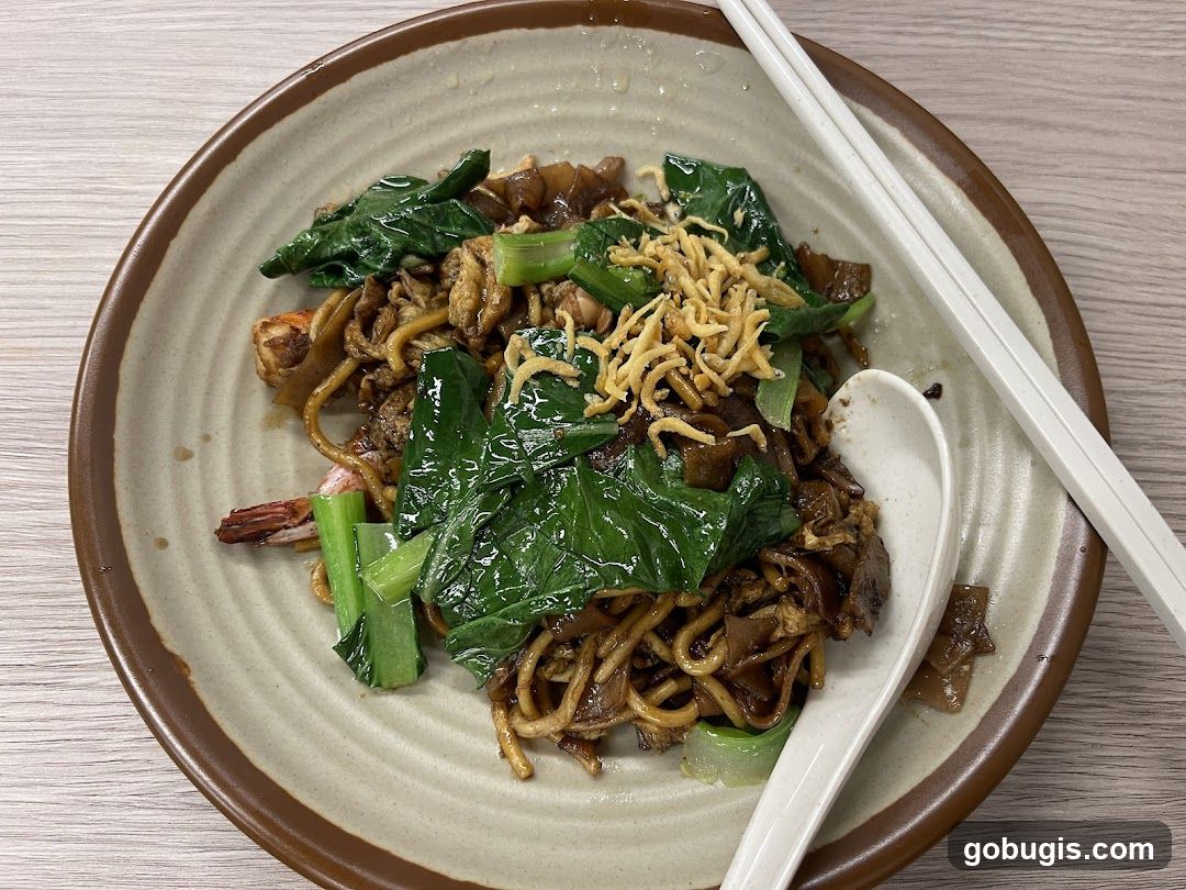 Plate of Noodles with Shrimp and Greens