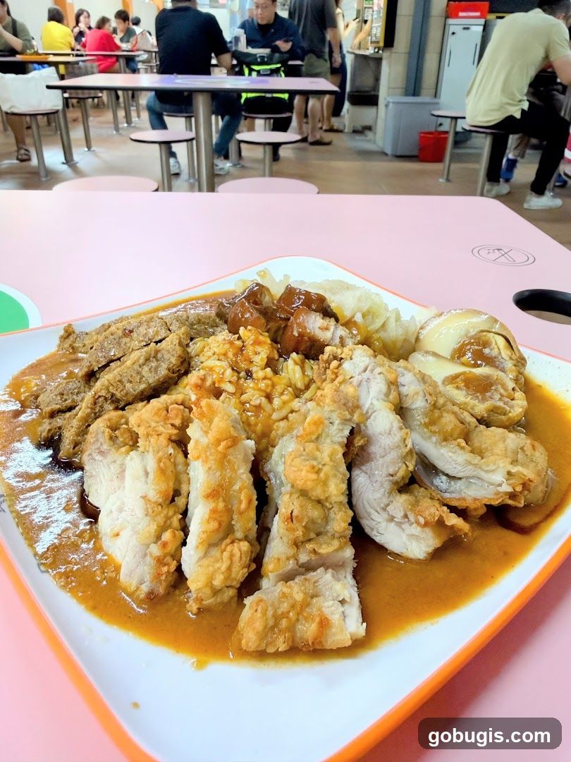 Plate of food with various meats and rice