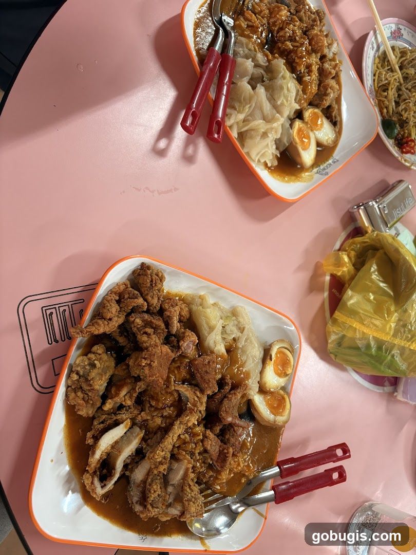 Plates of Food on a Pink Table