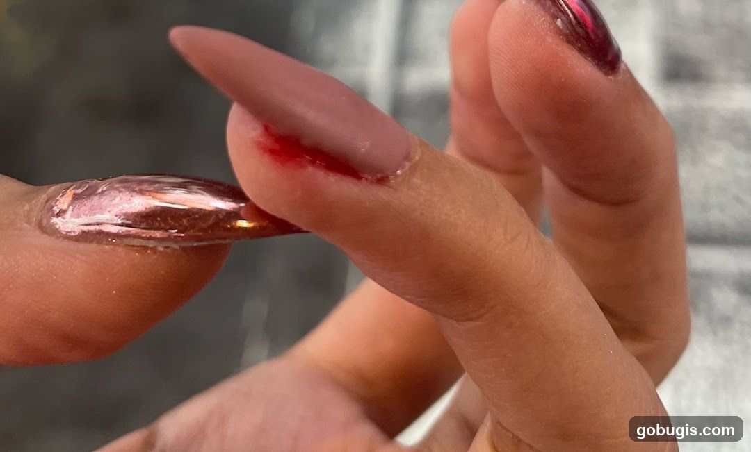 Bloody Cut on Finger with Nails