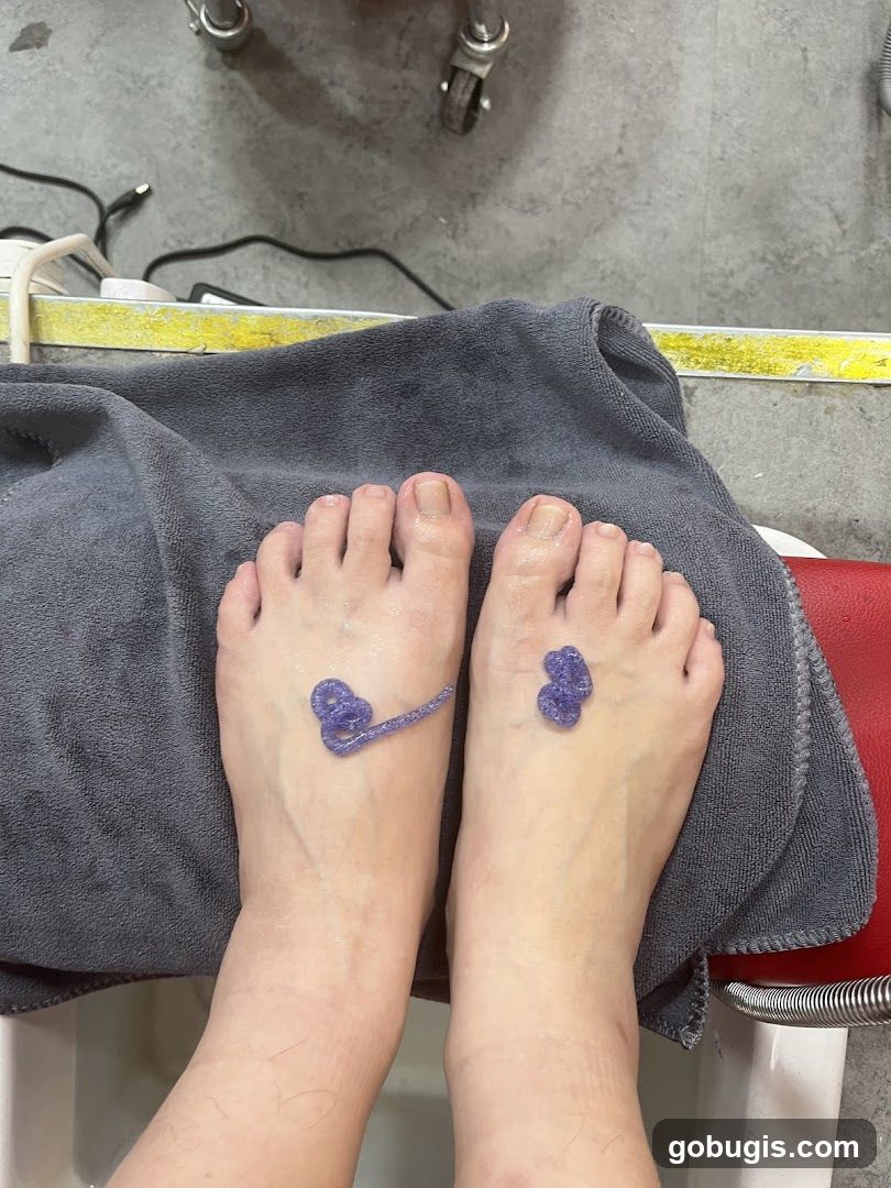 Feet with purple gel designs