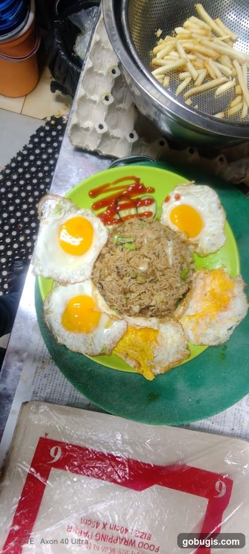 Fried Rice with Eggs and Fries
