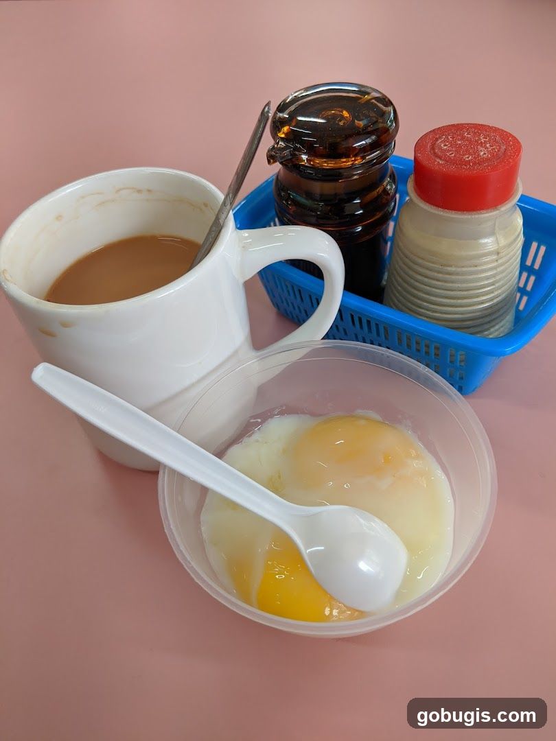 Soft-boiled eggs with coffee and condiments