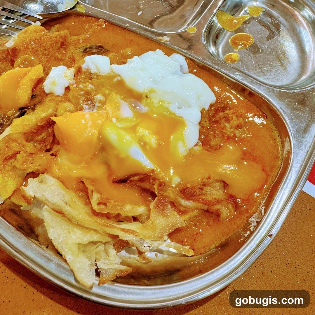 Roti Canai with Egg and Curry