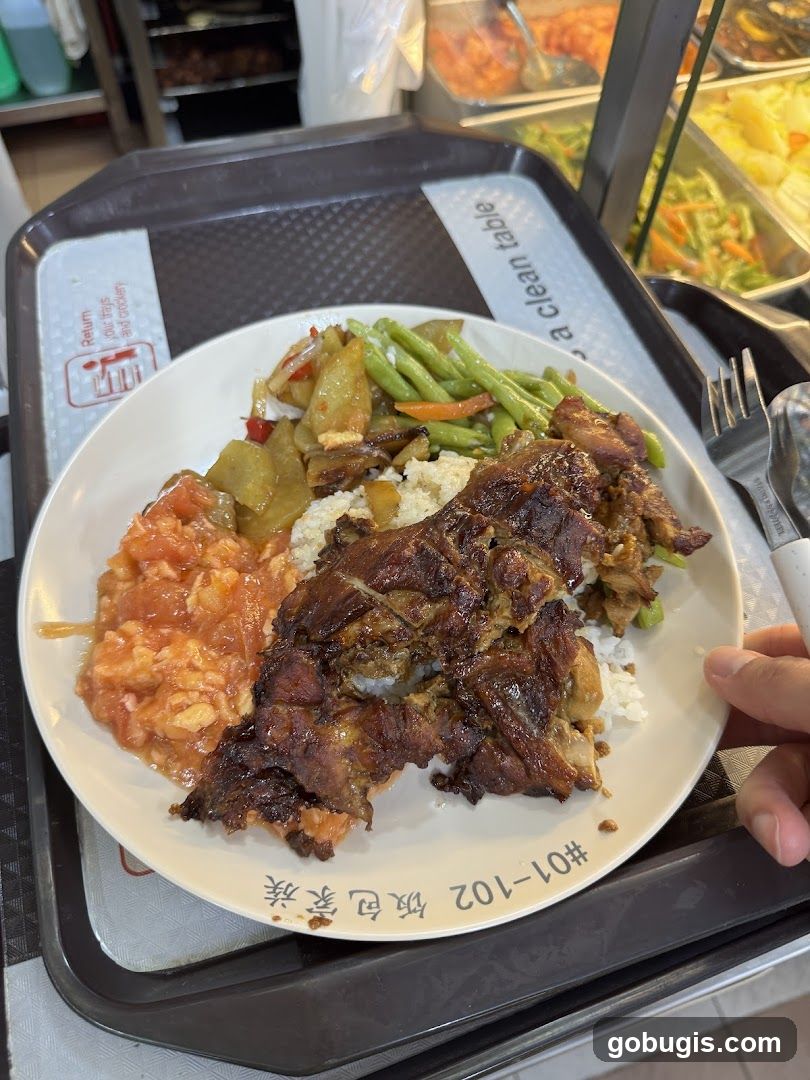 Plate of Food with Rice and Side Dishes