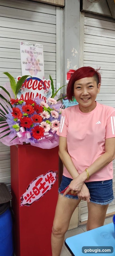 Woman Posing with Flower Arrangement