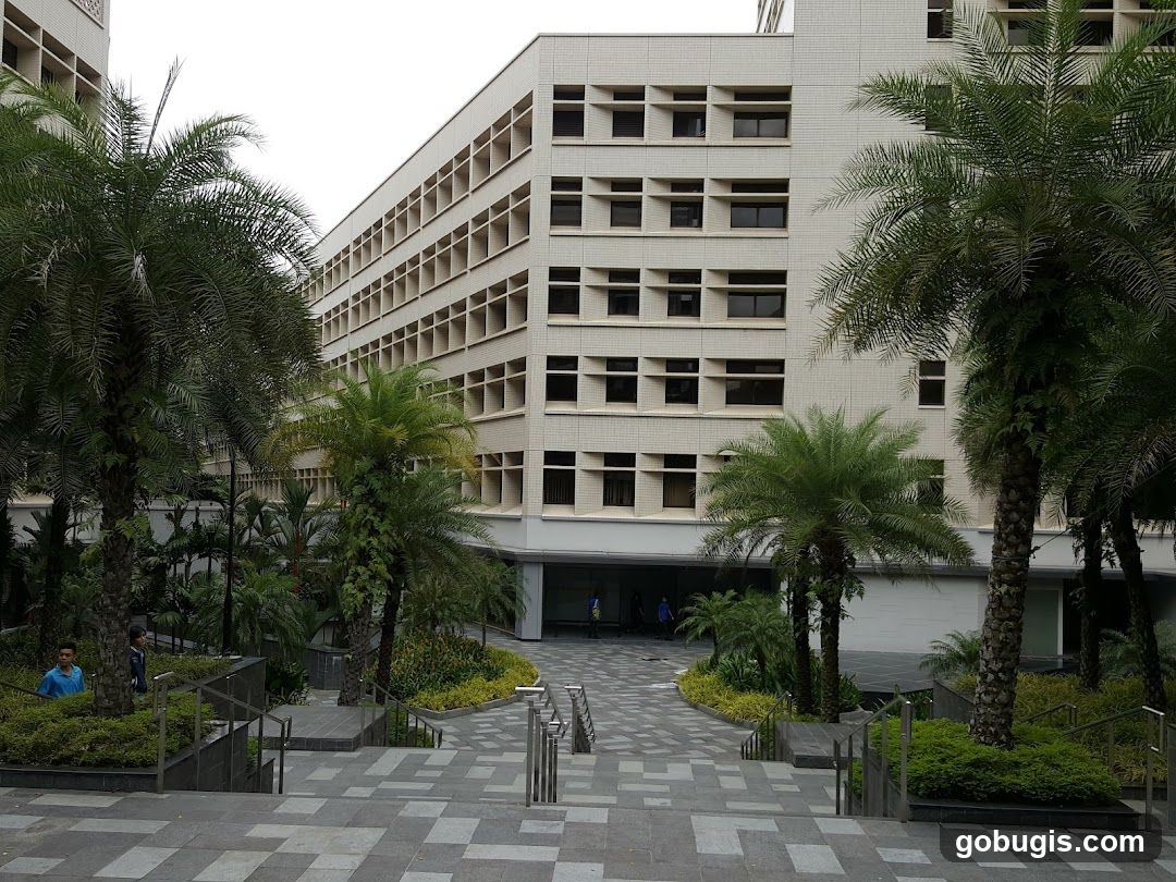 Modern Building Entrance with Palm Trees