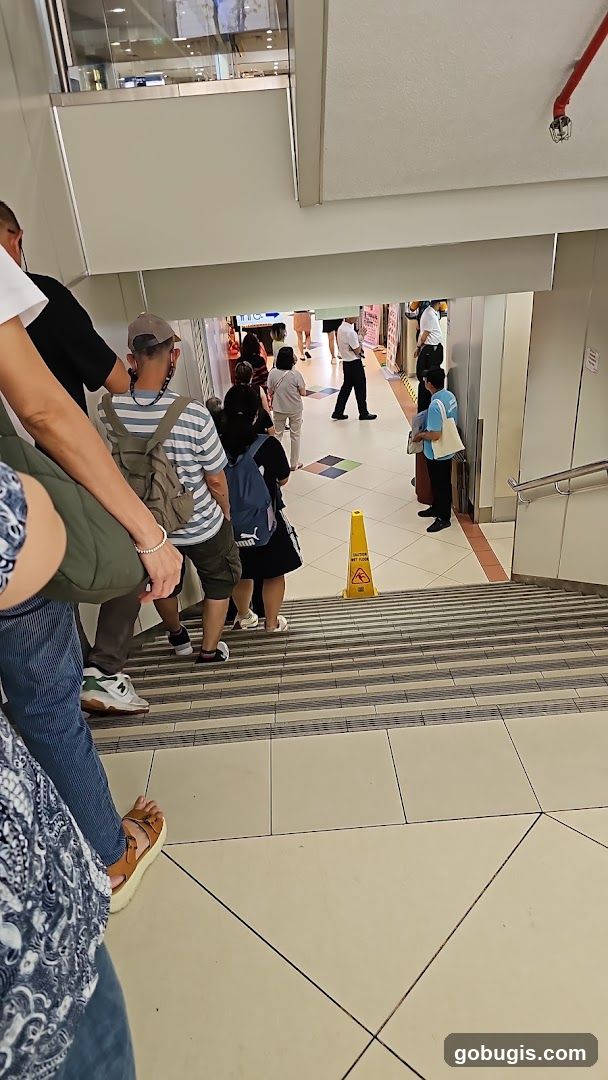 People in a mall hallway
