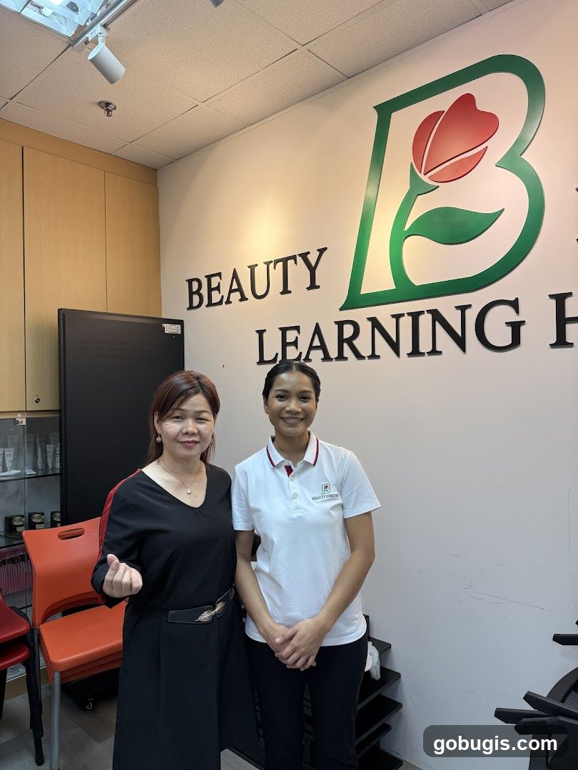 Two Women Posing in a Beauty Learning Center