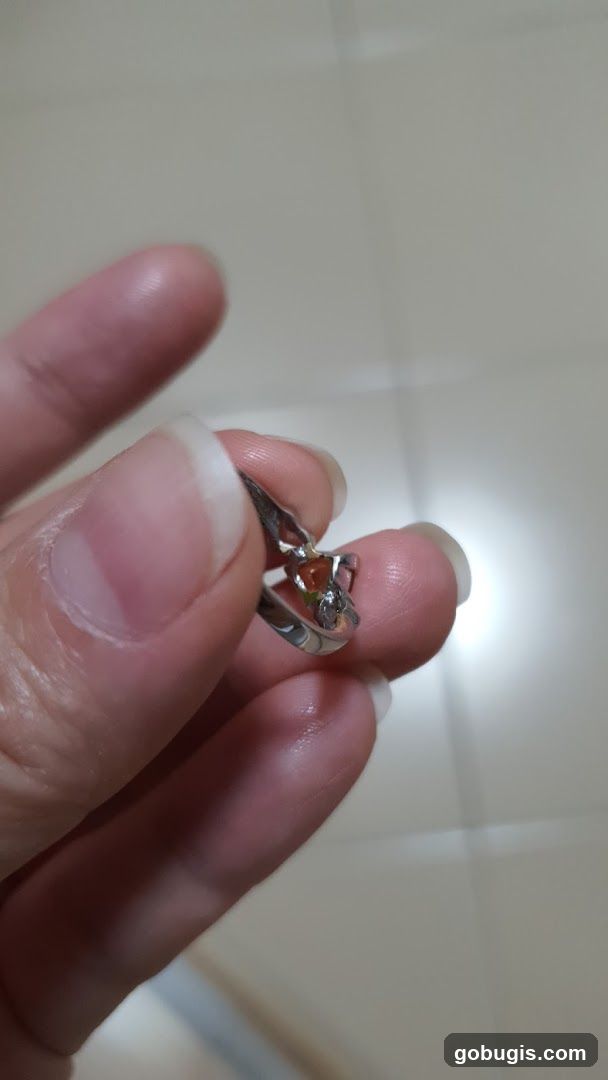 Ring with orange stone