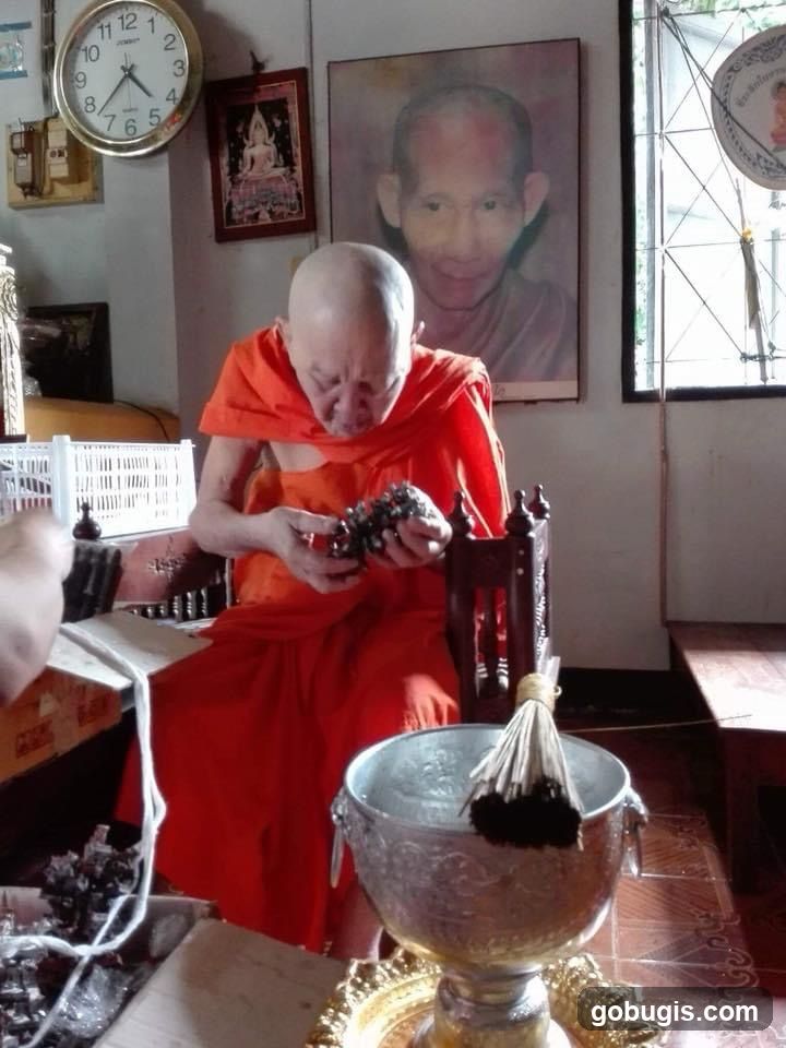 Monk with religious artifacts
