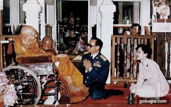 Monk in Wheelchair with Dignitaries