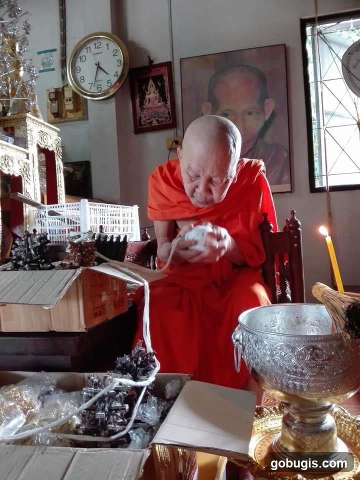 Monk with religious items