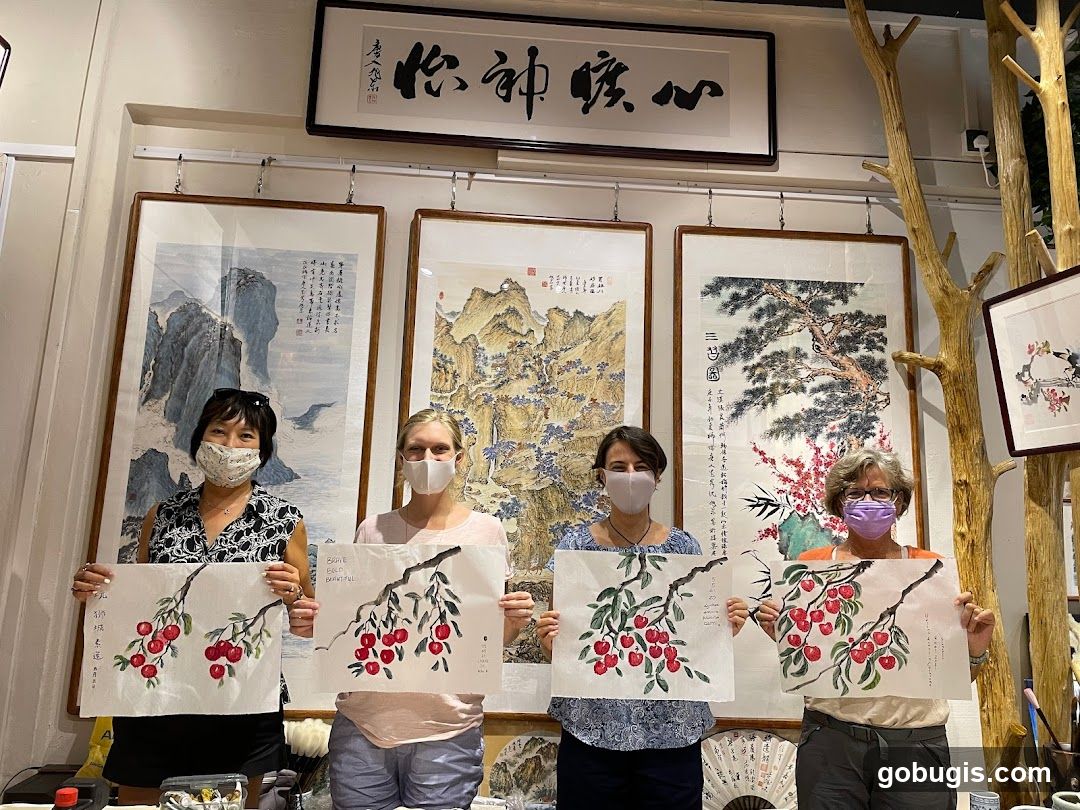 People holding artwork