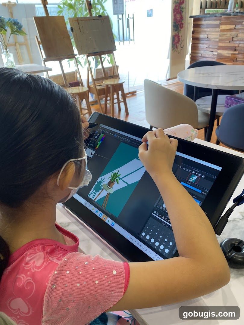 Child drawing on a tablet