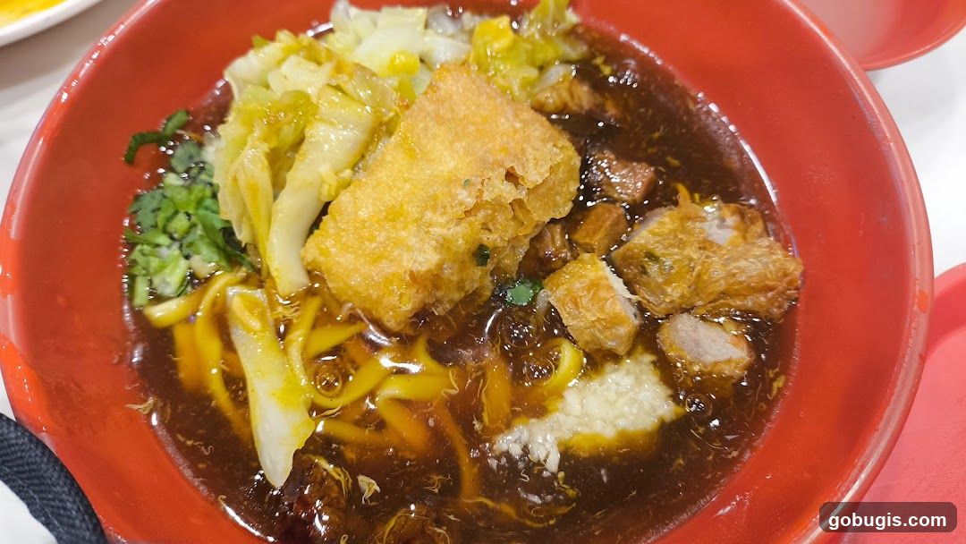 Noodle Soup with Fried Tofu and Meat