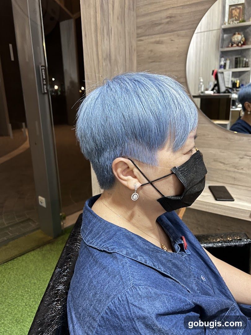 Woman with blue hair in salon