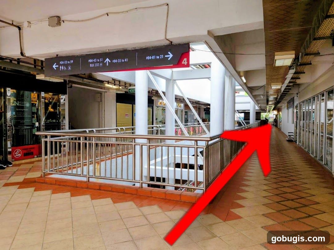 Indoor walkway with directional signs