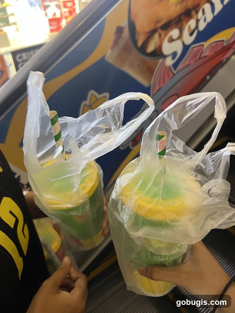 Two drinks in plastic bags