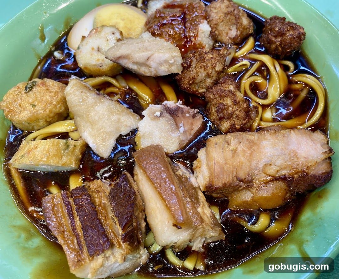 Noodles with Braised Pork and Fish Cakes