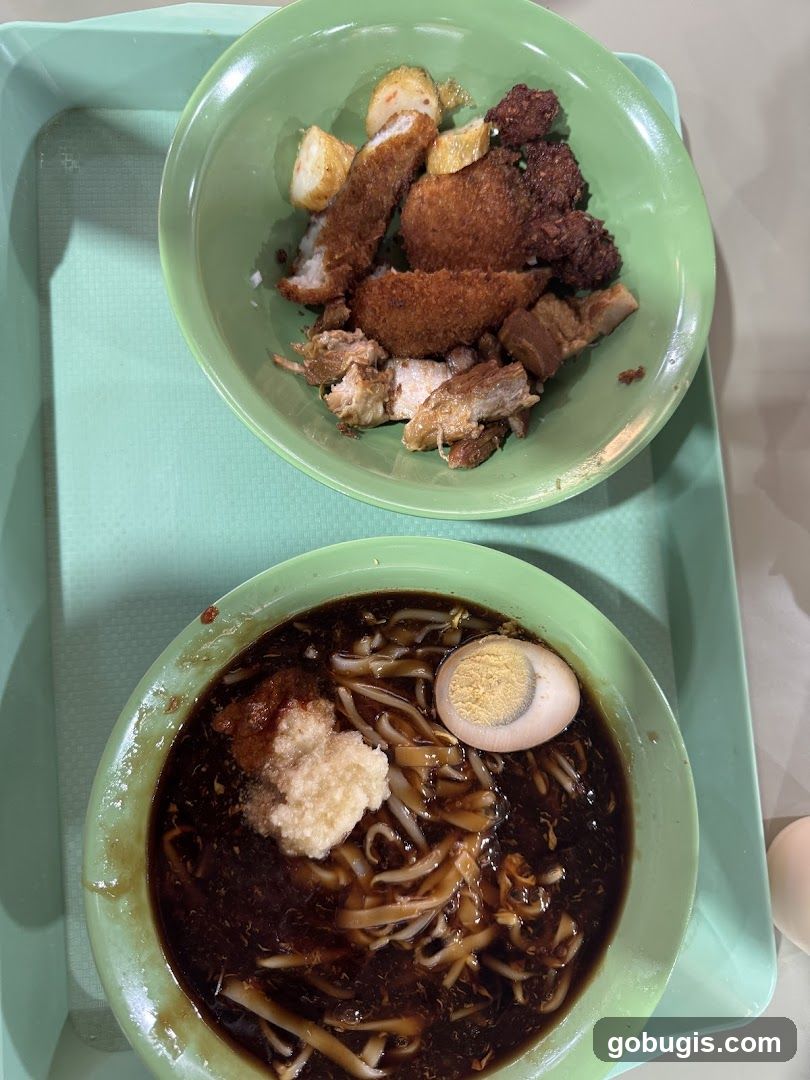 Two bowls of food on a tray