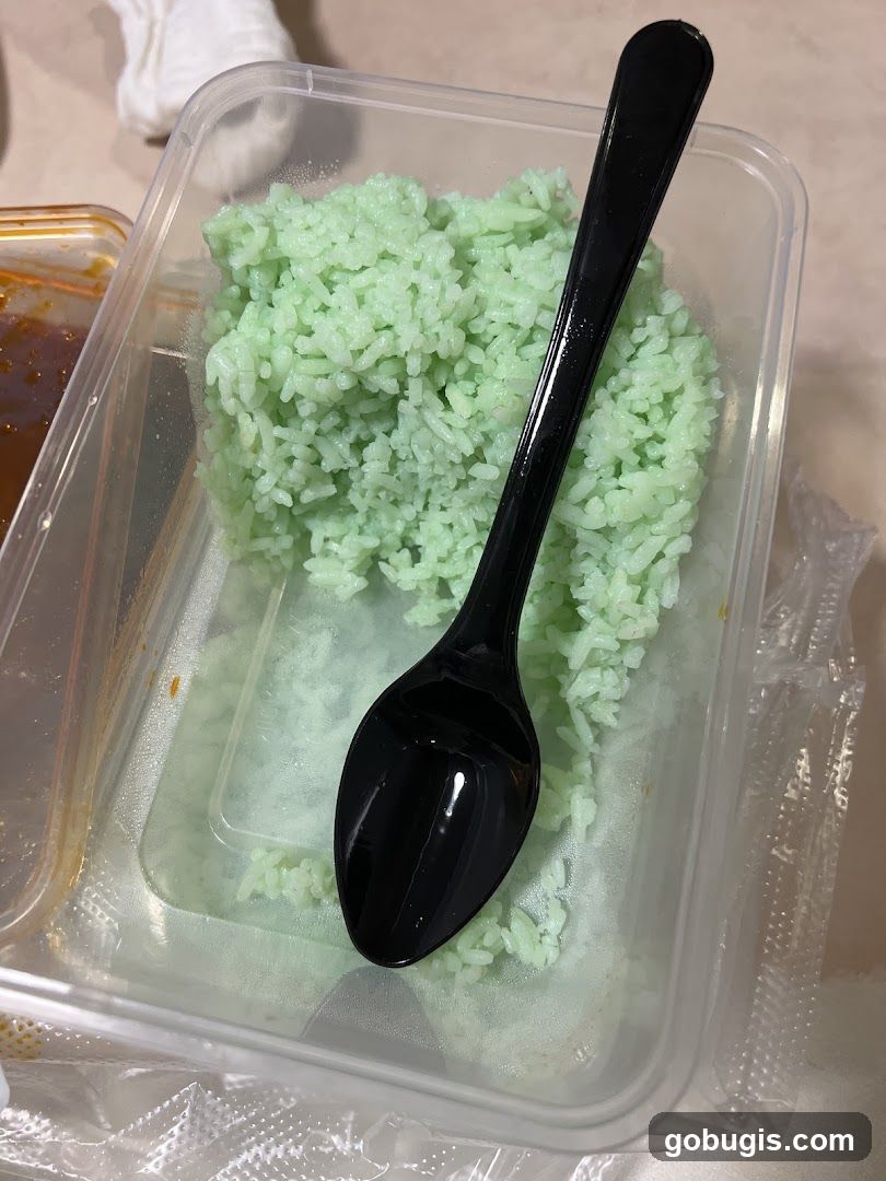 Green Rice in Takeout Container