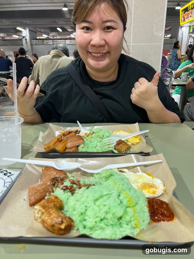 Woman giving a thumbs up with food