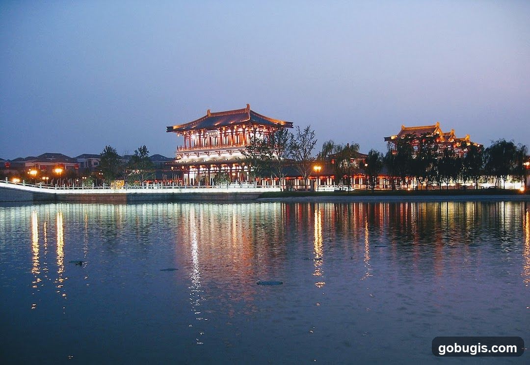 Traditional Chinese Architecture by Water at Dusk