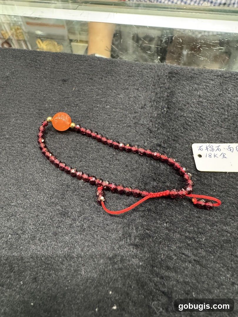 Beaded Bracelet with Orange Stone
