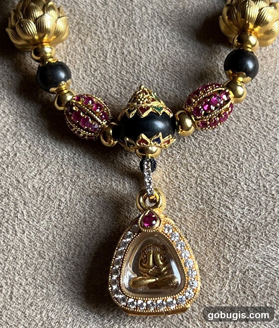 Gold Necklace with Buddha Pendant