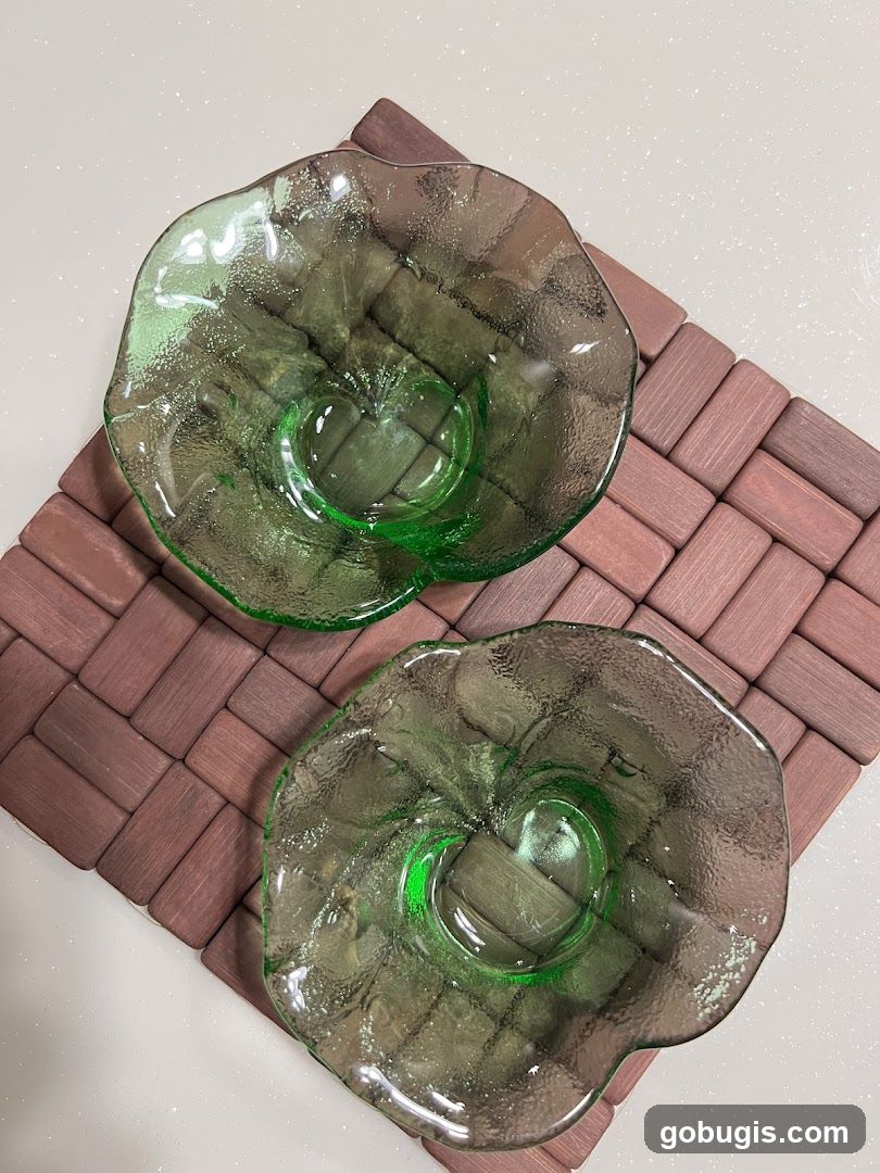 Two green glass bowls