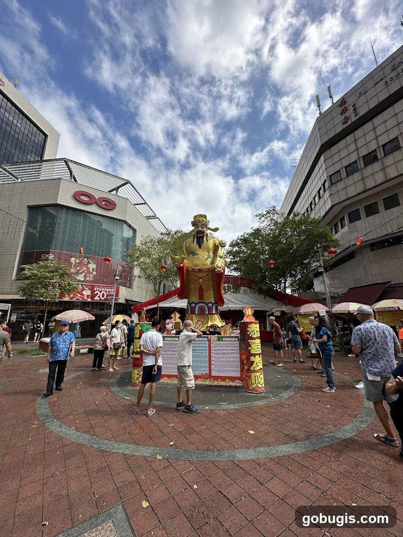 Outdoor Celebration with Golden Statue