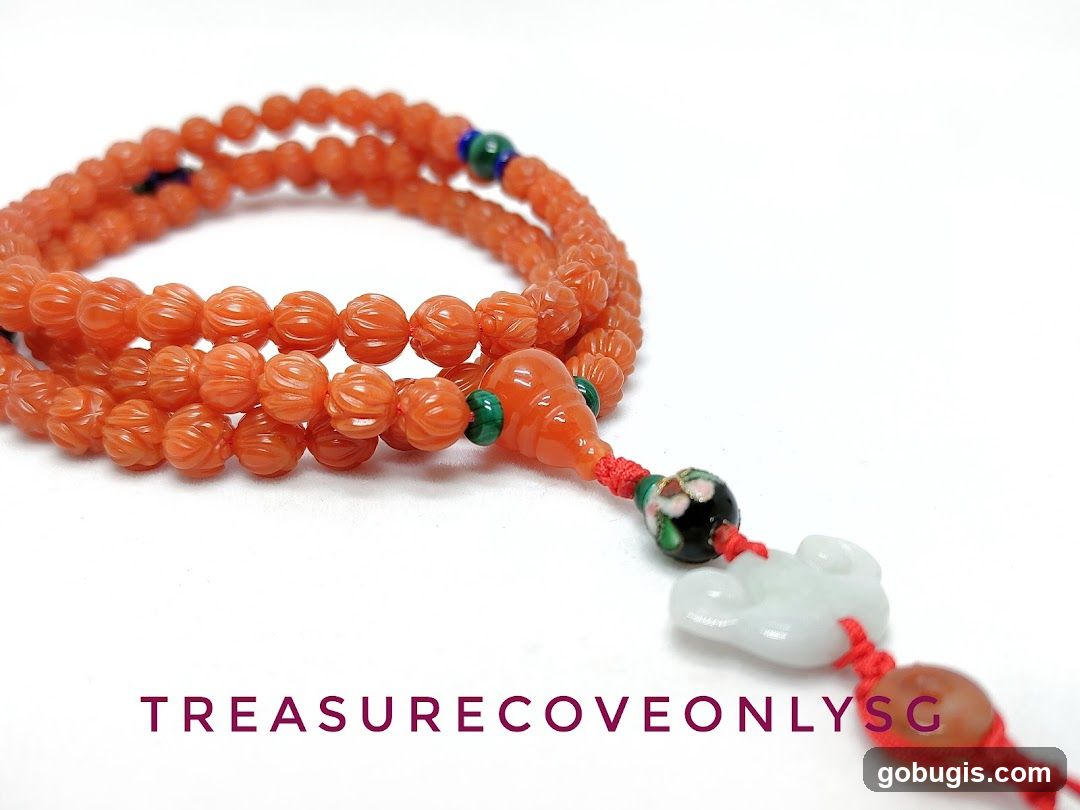 Orange Beaded Necklace with Jade Charm