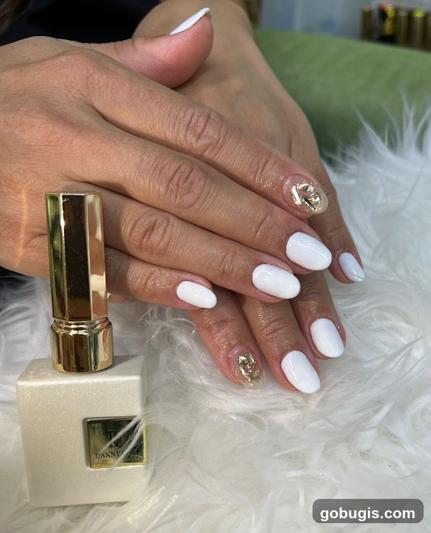 White Nails with Gold Accents