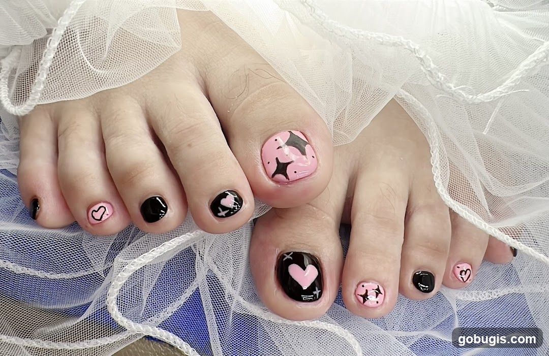 Toenails with Heart and Star Designs