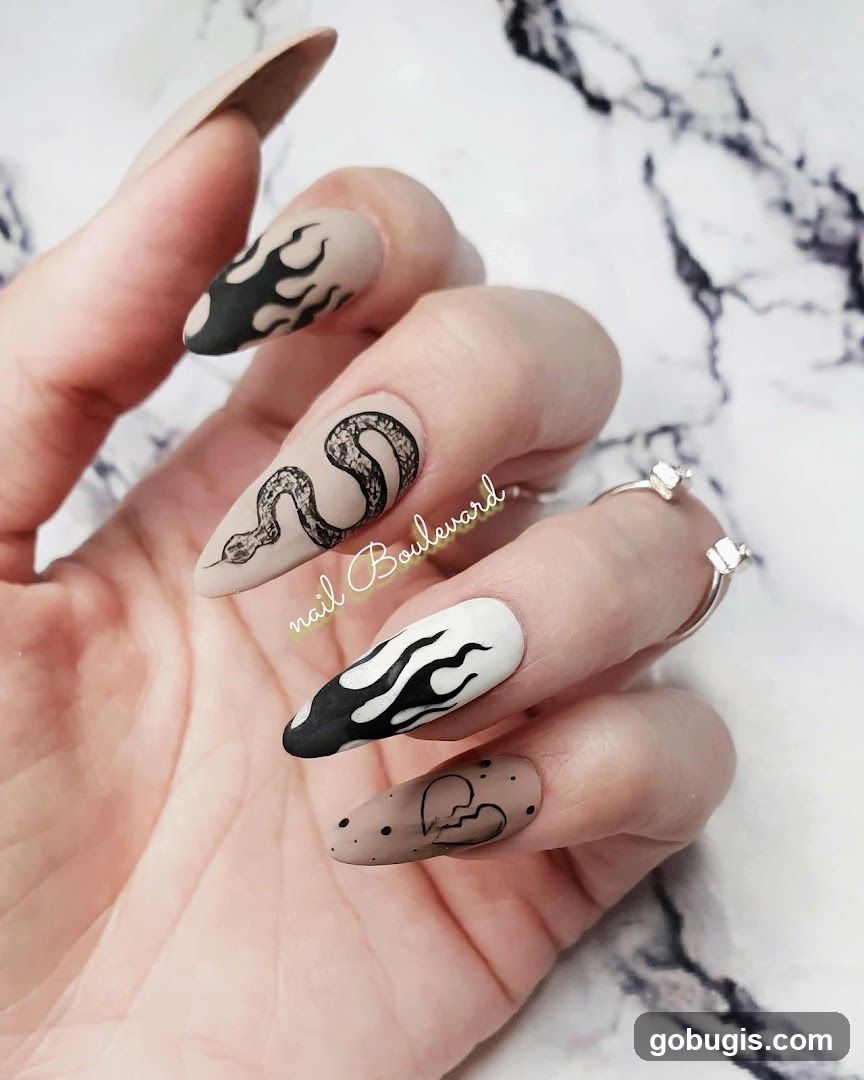 Nail Art with Snake and Flame Designs