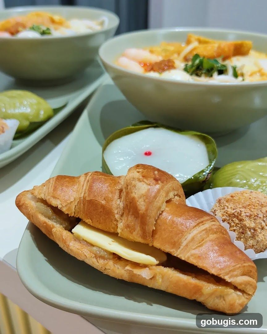 Croissant with Butter and Assorted Desserts