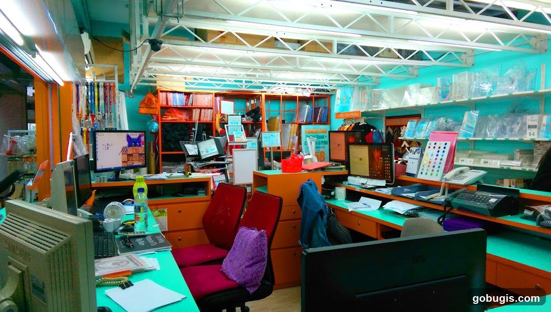 Cluttered retail counter with electronics and supplies
