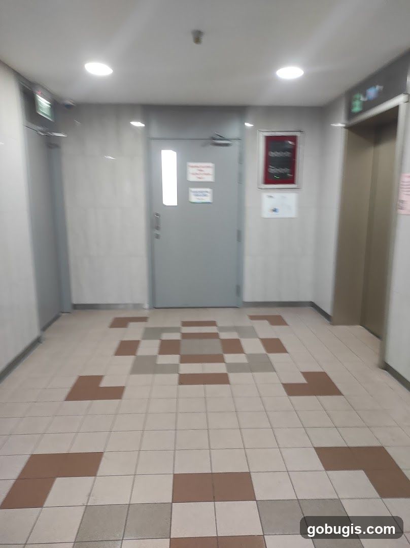 Hallway with elevators and doors