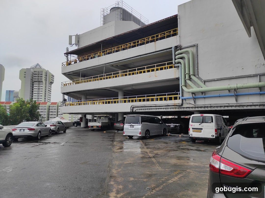 Multi-level parking garage with vehicles