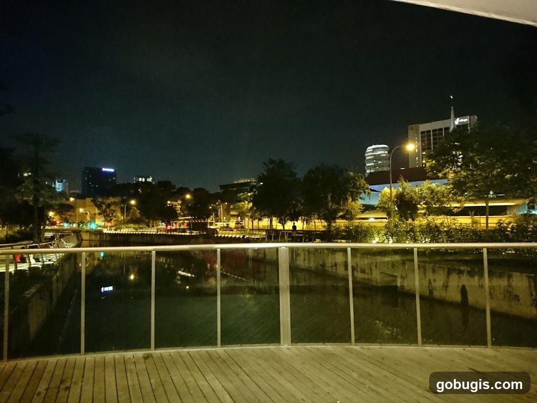 Nighttime cityscape with river