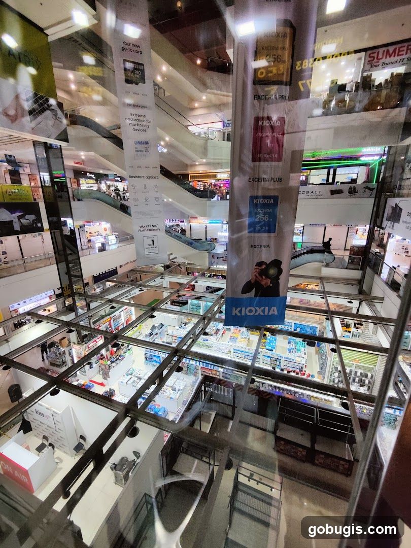 Mall Interior with Electronics Stores