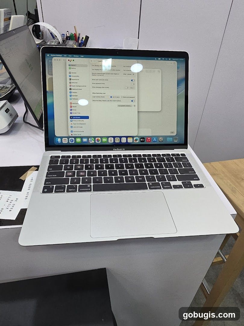 MacBook Air with System Settings Open