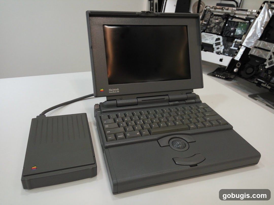 Vintage Macintosh PowerBook 180 with External Floppy Drive