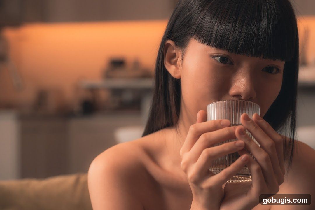 Woman drinking from a glass