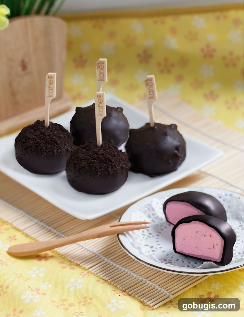 Chocolate-covered desserts with pink filling