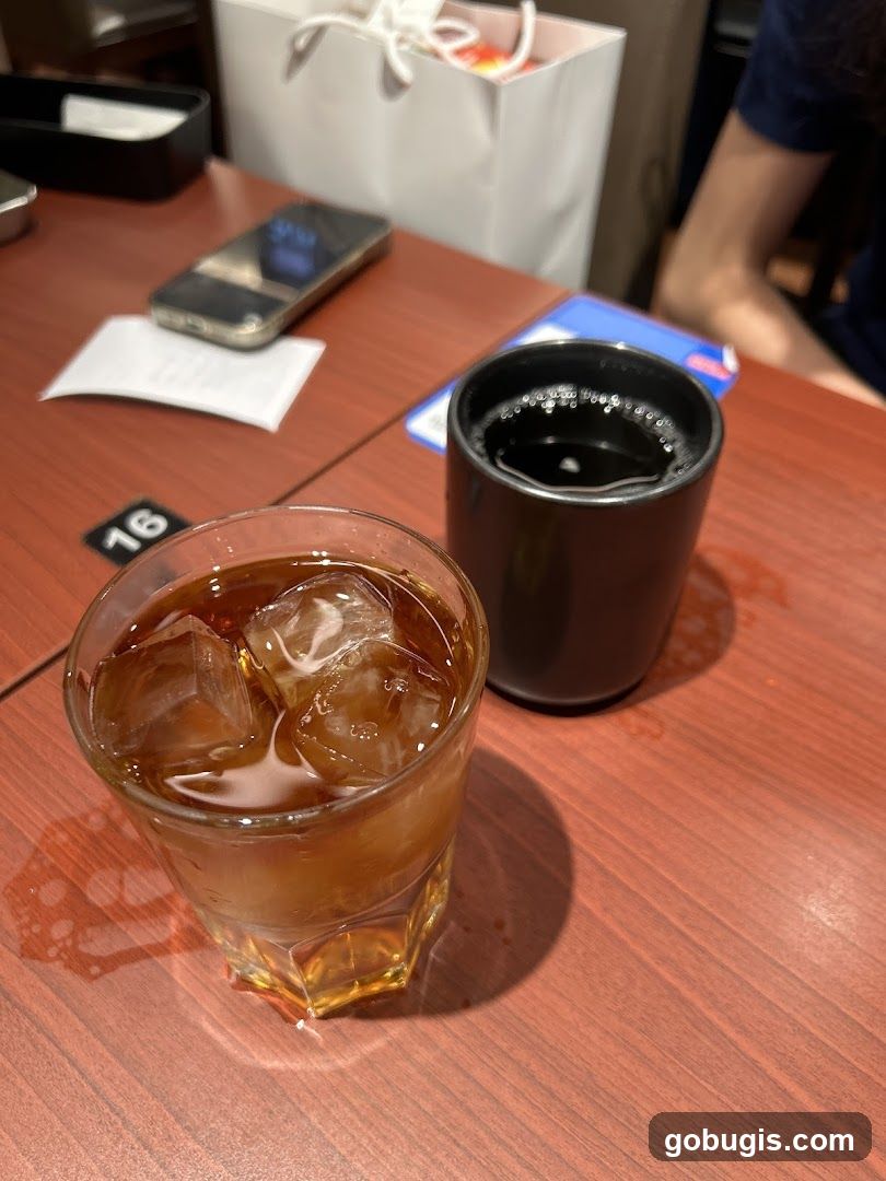 Table with drinks and phone
