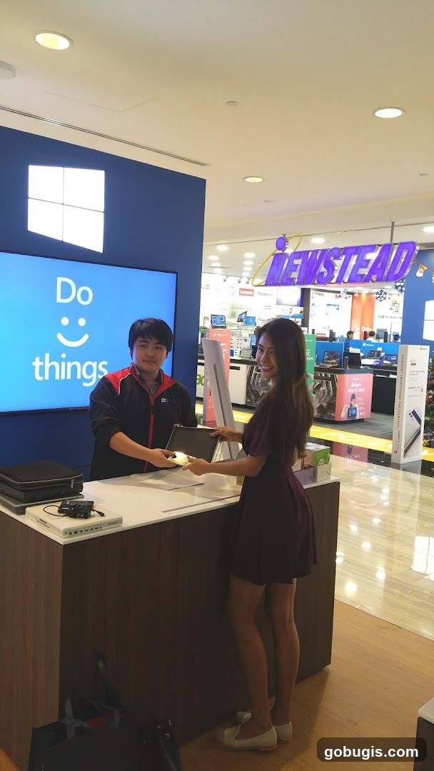 Customer receiving a laptop