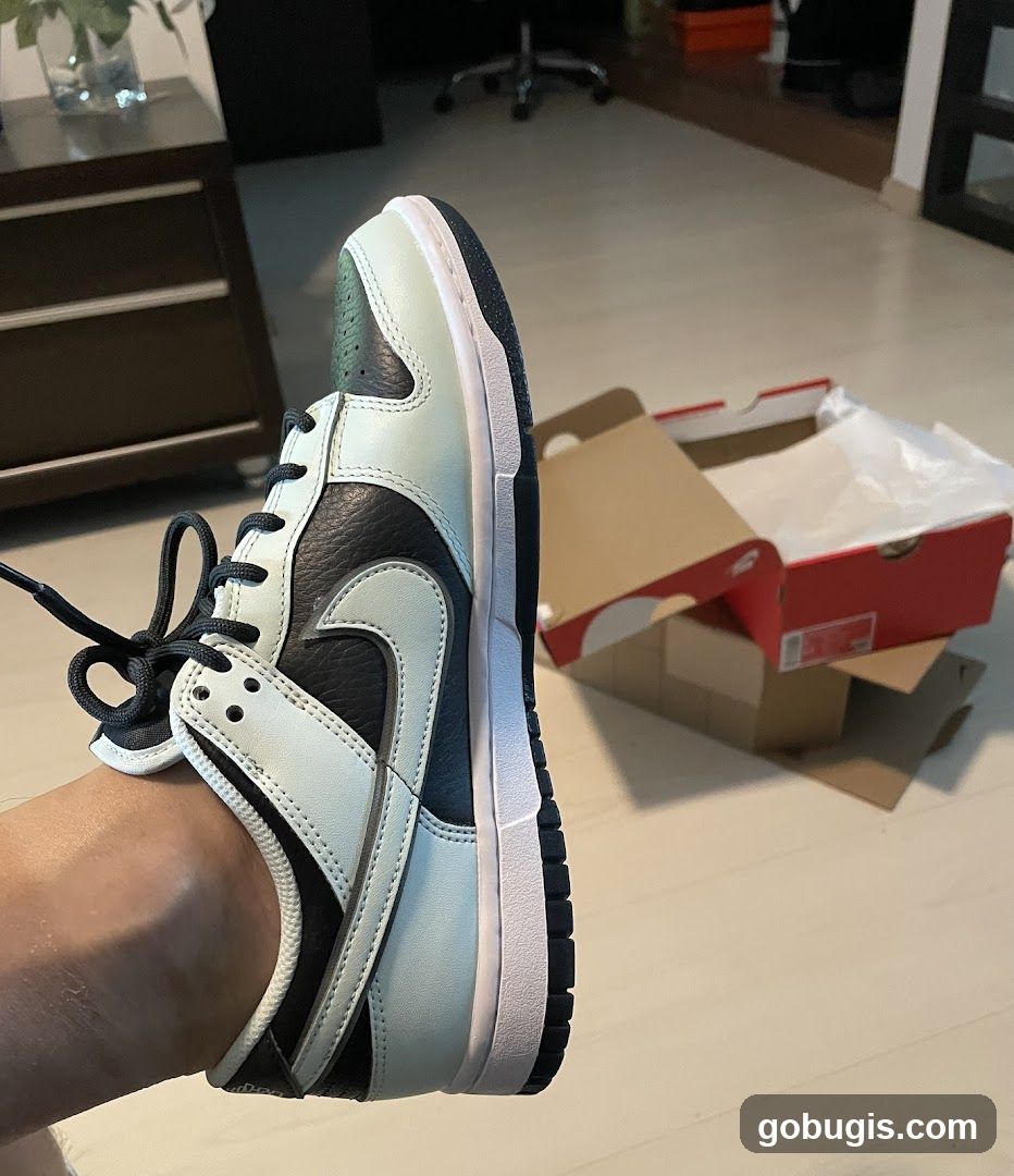 Sneaker on Foot with Shoe Boxes