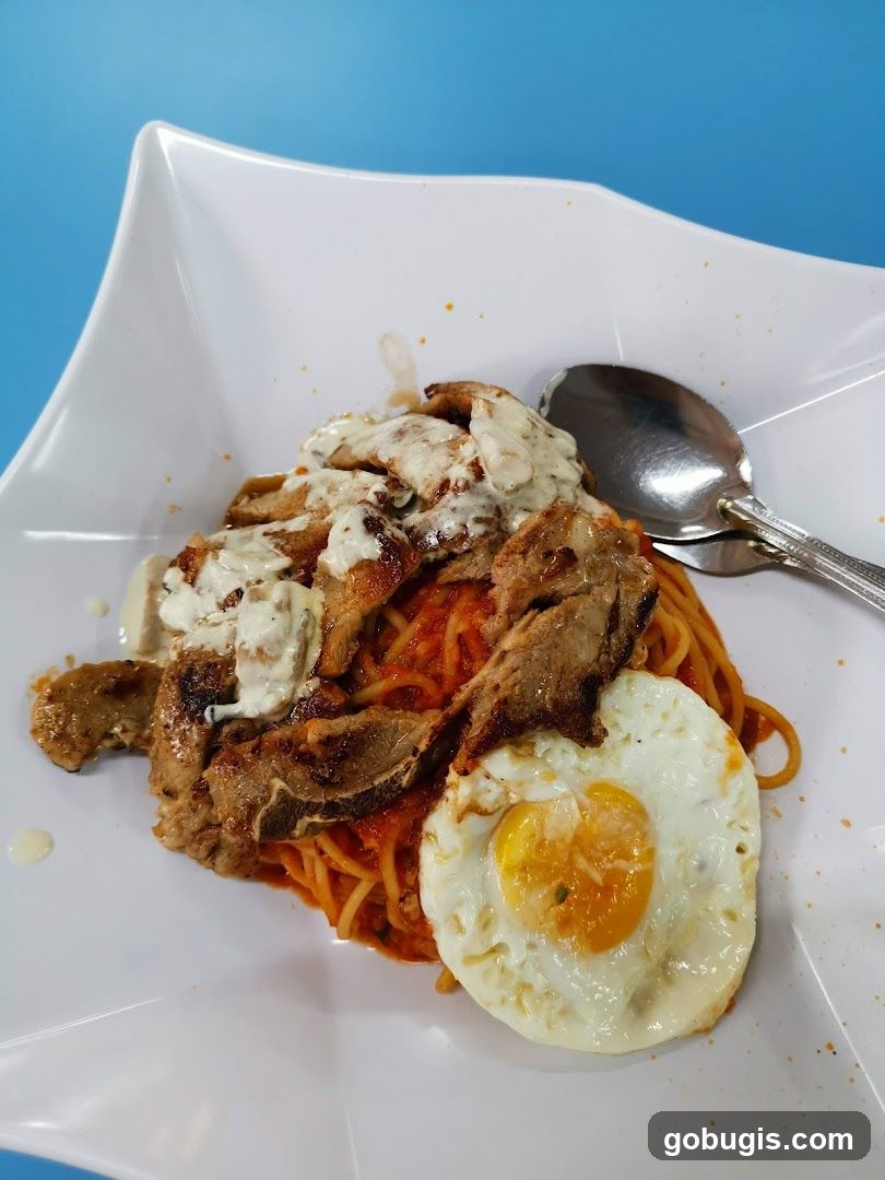 Spaghetti with Meat and Fried Egg